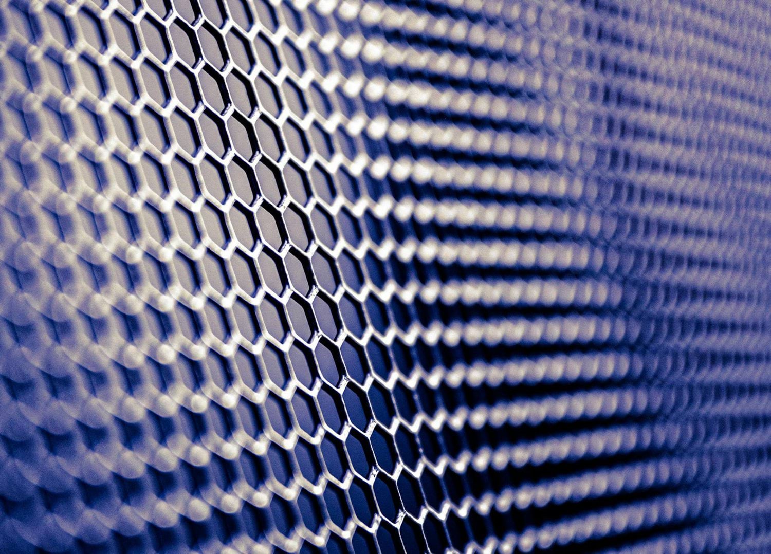 Close-up of carbon nanotube or graphene hexagonal structure representing advanced materials and life cycle assessment for sustainable innovation decision-making